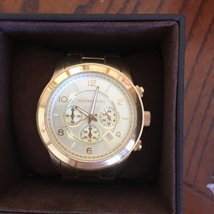 Gold oversized Micheal Kora watch